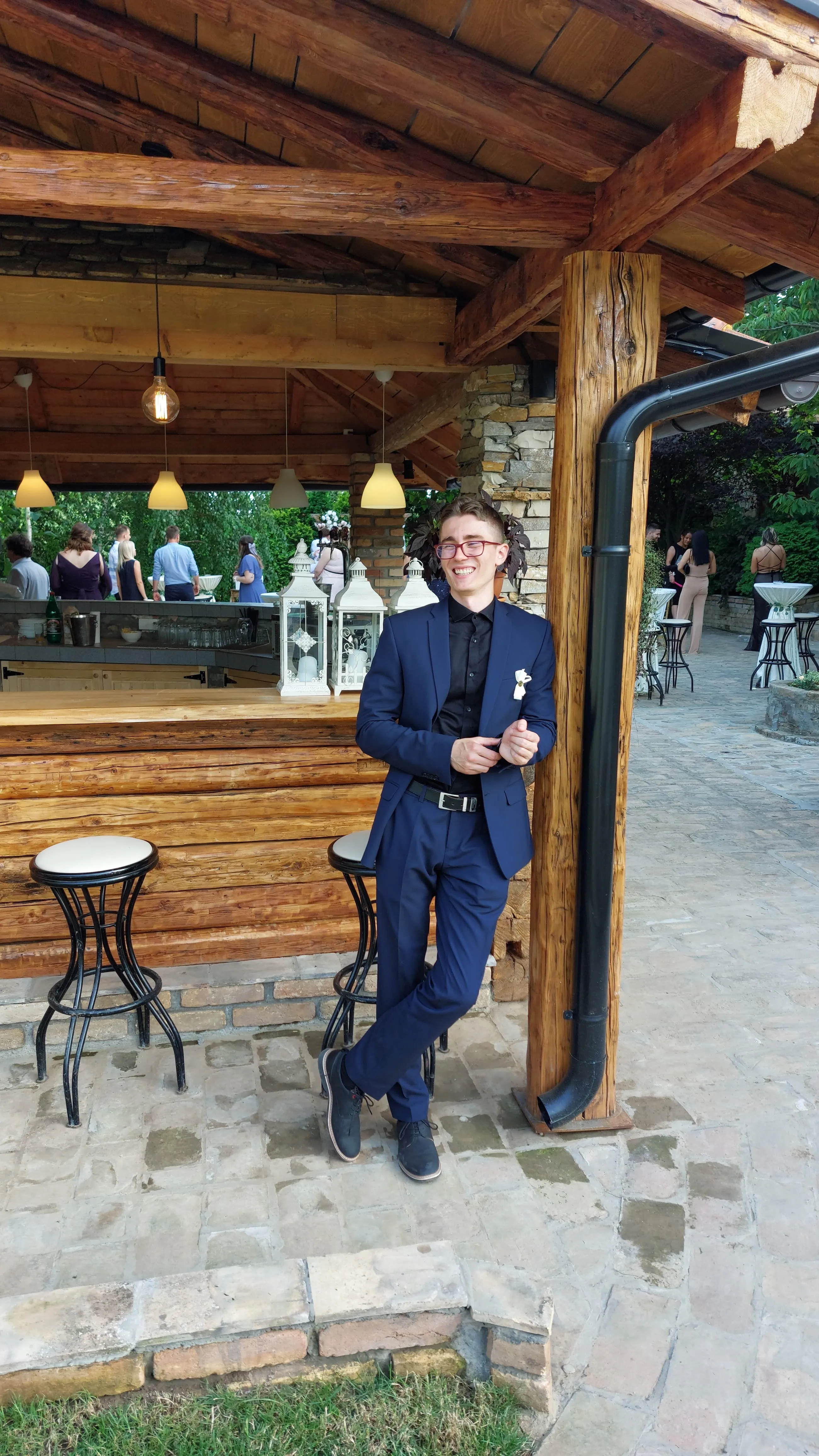 Ilija smiling while enjoying himself at a wedding